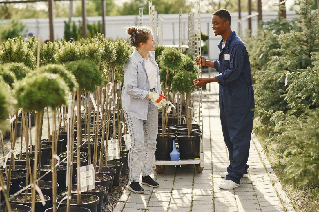 Gardener meeting a homeowner about a garden job